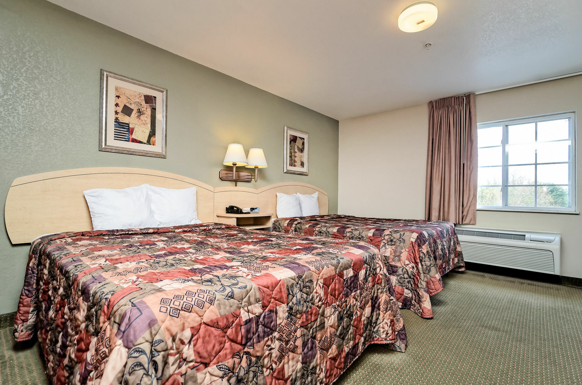 Hometowne Studios & Suites By Red Roof Bentonville Exterior photo